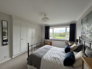 MASTER BEDROOM a- click for photo gallery
